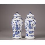 A pair of blue and vases with cover