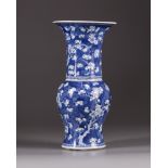 A Chinese blue and white 'prunus on cracked ice' phoenix tail vase