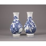 A pair of Chinese blue and white crackle-glazed vases