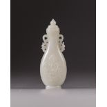 A small Chinese white jade flattened baluster vase and cover