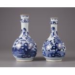 A pair of Chinese blue and white ‘peony’ bottle vase