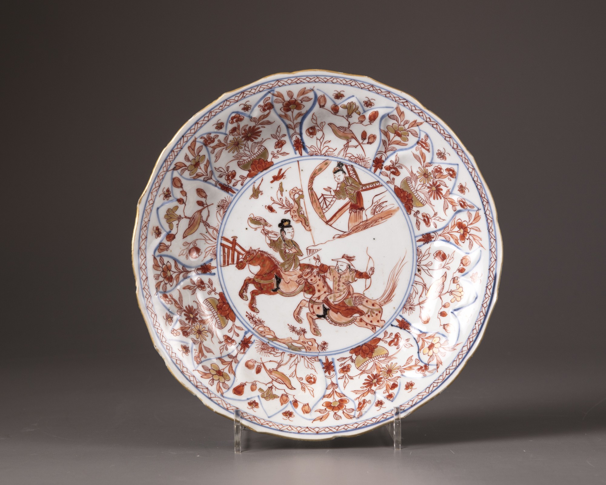 A Chinese imari moulded barbed-rim 'hunting' plate