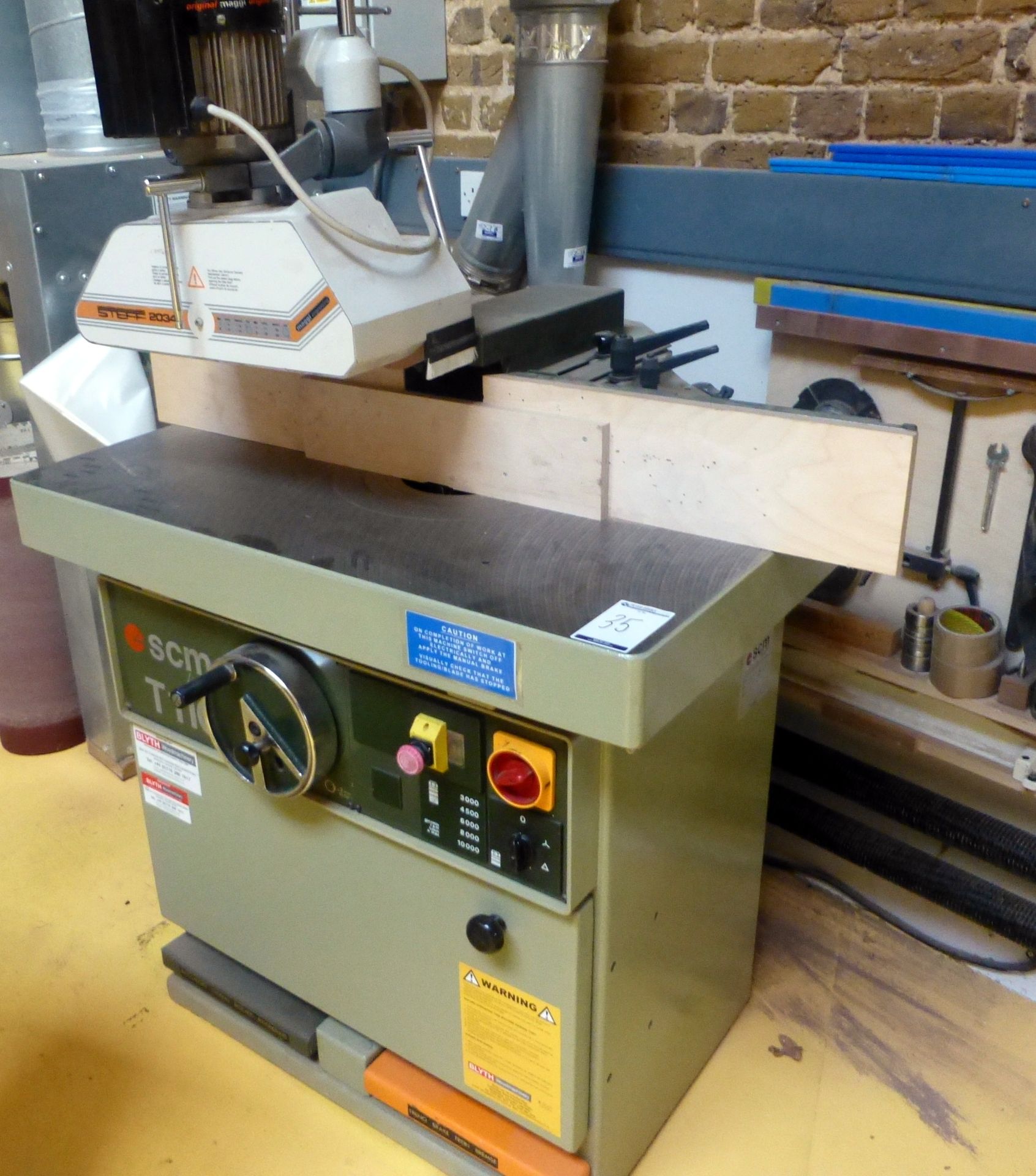SCM T110B Spindle Moulder, Serial No: AB1/5729 with Steff 2034 Power Feed Unit, Spare Cutter &
