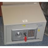 Small 'Micromark' electronic safe with key.