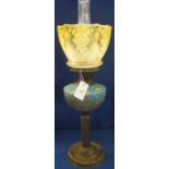 Early 20th Century brass double burner oil lamp with painted glass reservoir and brass pedestal