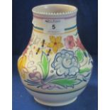 Poole Pottery white ground florally painted, baluster shaped vase.