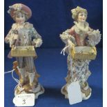 Pair of German Sitzendorf porcelain figures of street vendors in 18th Century dress.