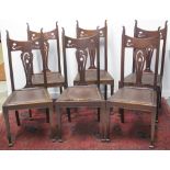 SET OF SIX EDWARDIAN MAHOGANY UPRIGHT PARLOUR CHAIRS, in Art Nouveau style with scrolled ears,