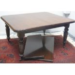 VICTORIAN MAHOGANY WIND OUT EXTENDING DINING TABLE, the moulded edged top with curved angles,