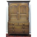 EARLY 19TH CENTURY WELSH OAK, TWO STAGE PRESS CUPBOARD, having moulded cornice over a pair of blind,