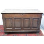 18TH CENTURY OAK PANELLED COFFER, having moulded edge, hinged top,