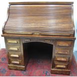 GOOD QUALITY MAHOGANY 'S' ROLL TOP PRESENTATION DESK, having fitted interior,