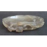 WELL CARVED CHINESE HARDSTONE DISH IN THE FORM OF A LOTUS LEAF,