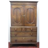 EARLY 19TH CENTURY WELSH OAK, TWO STAGE PRESS CUPBOARD, having fluted,