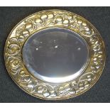 KESWICK SCHOOL OVAL BEVELLED MIRROR with Art Nouveau design, foliate, repousse oval shaped frame,
