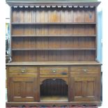 LARGE LATE 19TH CENTURY PITCH PINE DRESSER, having moulded cornice over angular,