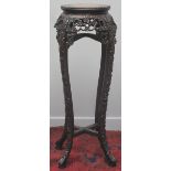 CHINESE PADOUK WOOD JARDINIERE OR FISH TANK STAND, having beaded circular top with inset marble,