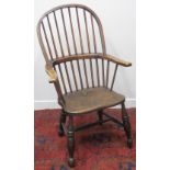 19TH CENTURY ASH AND ELM HOOP BACKED ELBOW CHAIR, having moulded seat on baluster turned legs.