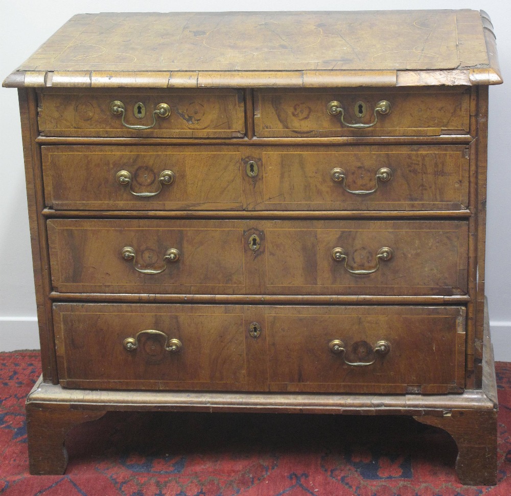 18TH CENTURY WALNUT STRAIGHT FRONTED CHEST of two short and three long drawers,