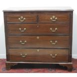 EARLY 19TH CENTURY MAHOGANY STRAIGHT FRONTED CHEST of two short and three long, graduated drawers,