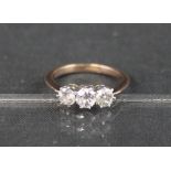 18CT GOLD THREE STONE DIAMOND DRESS RING. CONDITION REPORT: Ring size K approx.