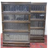 PAIR OF GLOBE WERNICKE OAK FOUR STAGE BOOKCASES,