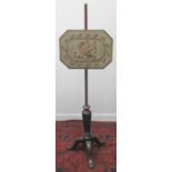 19TH CENTURY MAHOGANY POLE SCREEN with original foliate tapestry banner on triform base.