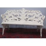 A COALBROOKDALE DESIGN CAST IRON FERN LEAF PATTERN GARDEN SEAT OR BENCH with slatted wooden seat