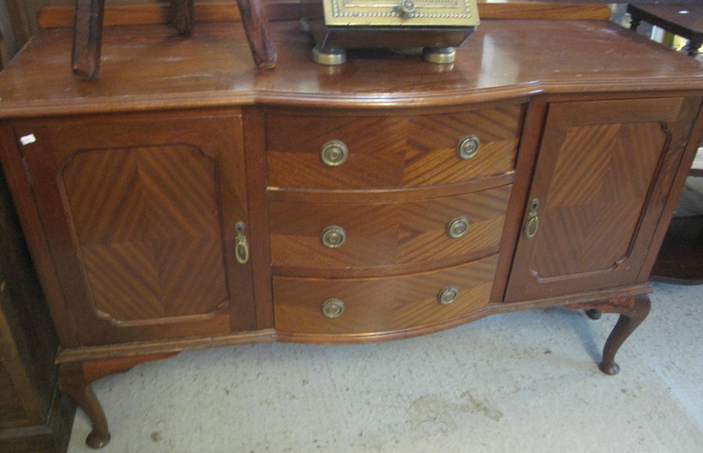 Early 20th Century mahogany bow front sideboard on cabriole legs.