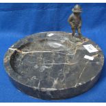 Large circular veined marble shallow dish with bronzed metal figure of a small boy dipping his toe.