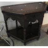Early 20th Century heavily carved oak, two tier side folding table.
