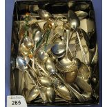 Small tray of assorted silver and plated loose cutlery to include: tea strainer;