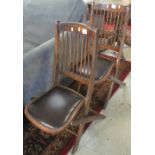 Pair of 20th Century spindle back stained folding chairs.