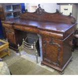 Victorian mahogany two pedestal sideboard, having two blind panel cupboards to the pedestals,