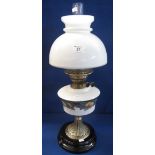 Early 20th Century double burner oil lamp with printed ceramic reservoir,