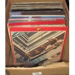 Box of assorted vinyl LPs and RPMs to include: Madness, 'One Step Beyond'; The Beatles,