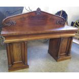 Victorian mahogany two pedestal sideboard with turned hexagonal pillars on platform bases.