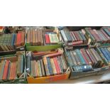 Eight trays of assorted antique books, various,