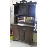 Edwardian stained oak two stage mirror back sideboard with central stained glass panelled cupboard