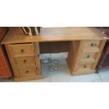 Modern Mexican pine kneehole pedestal desk.