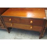 Mahogany chest of two short and one long drawer with knob handles, on square legs.