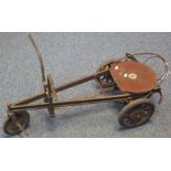 Mid 20th Century child's metal go kart of tricycle form,