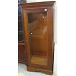 Modern hardwood single door, glazed display cabinet.