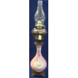 Unusual single burner oil lamp with glass reservoir in metal frame on opaline glass,