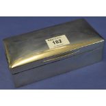 Silver rectangular cigarette box with engraved initials to top, London hallmarks.