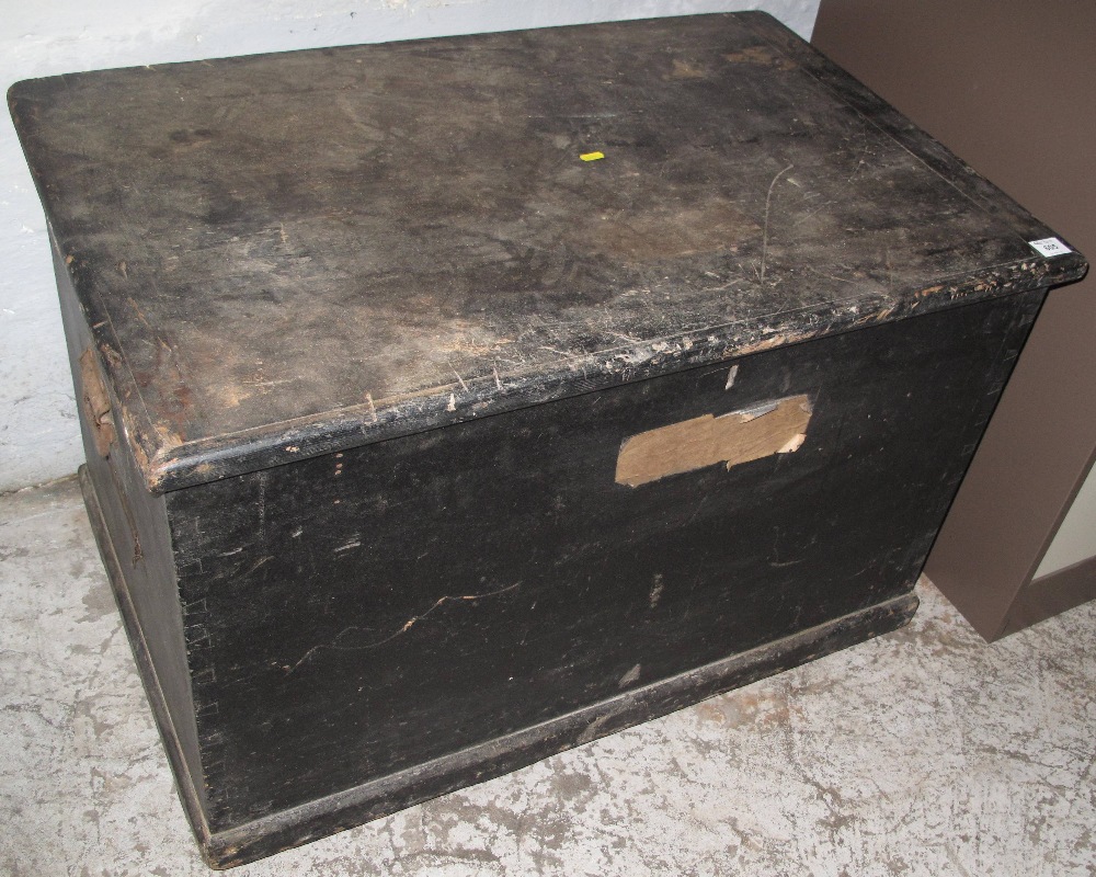 19th Century stained pine trunk with fitted candle box and metal carrying handles.