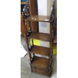 Early 20th Century oak two drawer hanging wall or display rack with pierced carved side panels.