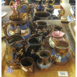 Tray of assorted copper lustre dresser jugs etc.