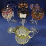 Group of assorted cut lead crystal coloured hock glasses, together with a cut crystal,