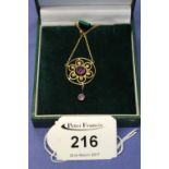 Yellow metal, seed pearl and amethyst flower head pendant on yellow metal chain, in box.